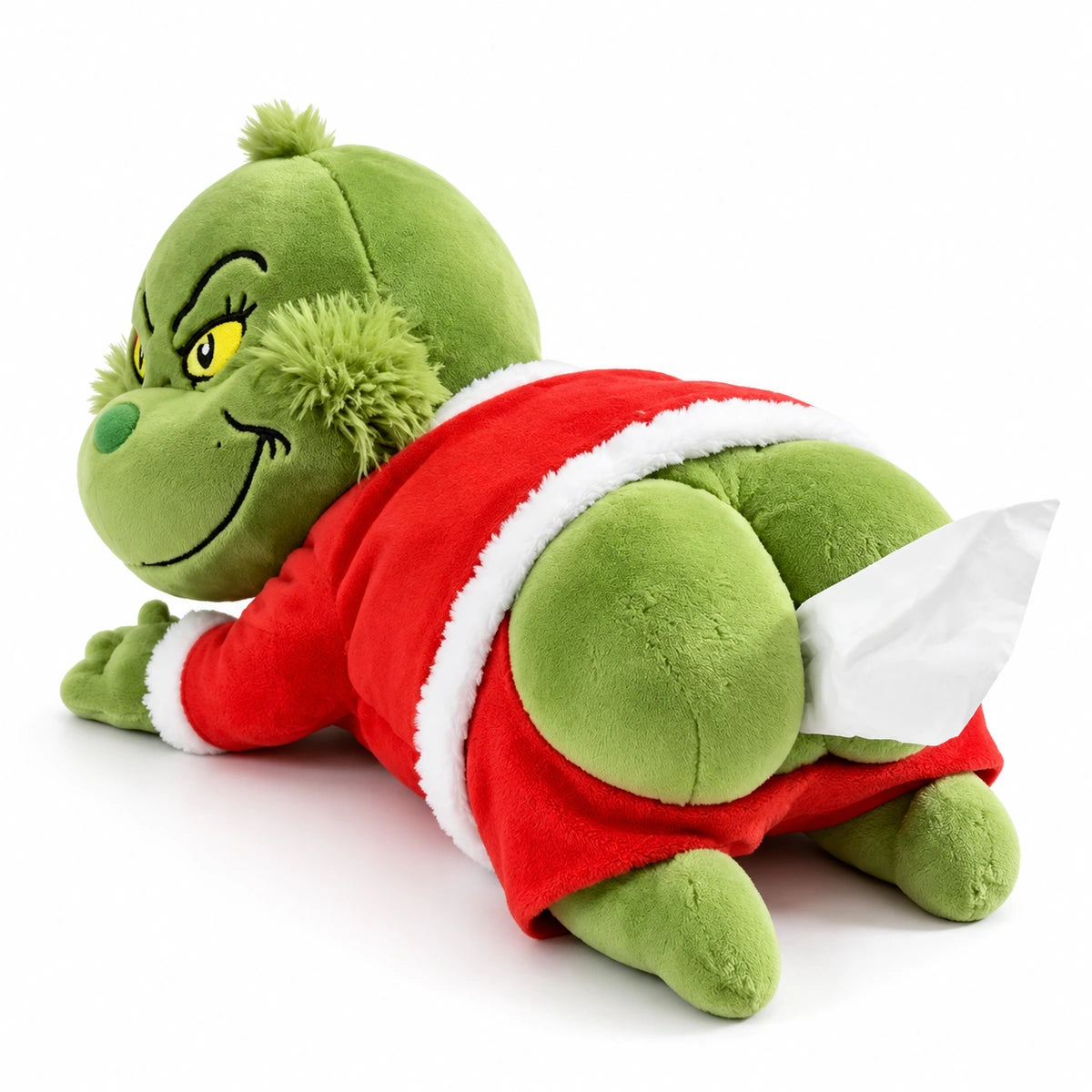 Green Grinch plush tissue holder in a red Santa outfit, with a tissue emerging from the rear opening, on a white background.
