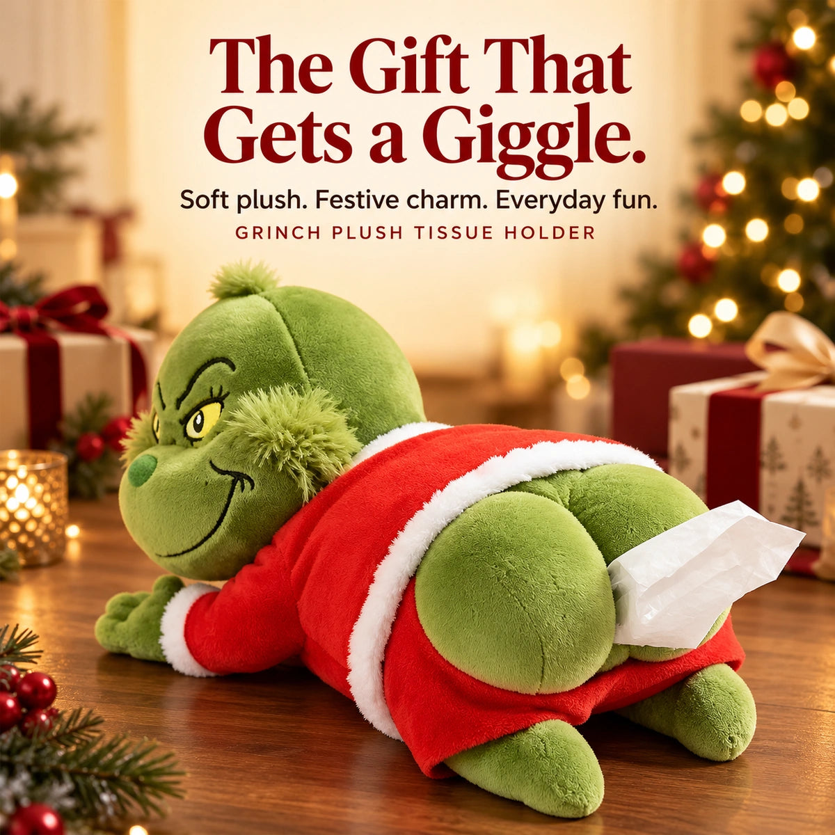 Grinch plush tissue holder in a red Santa outfit beside Christmas gifts, with “The Gift That Gets a Giggle” text.